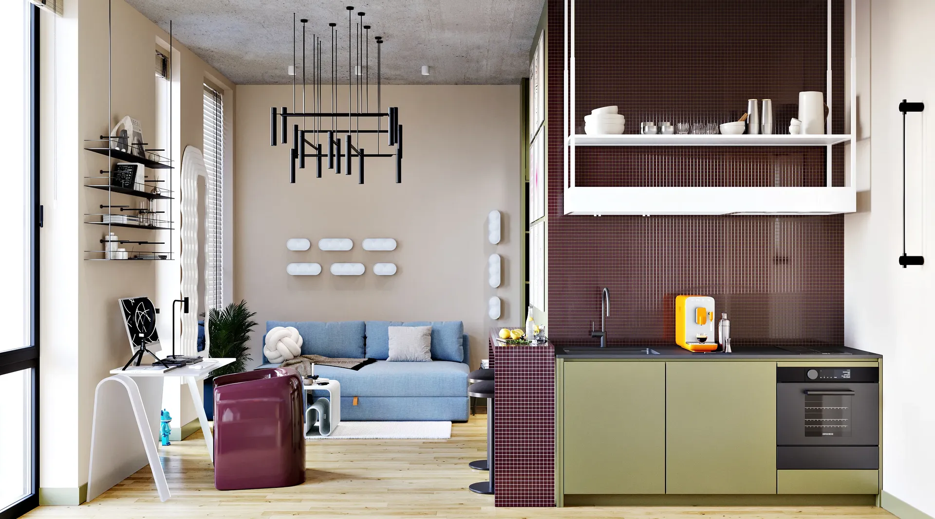 Open-plan studio layout showing kitchen, living, and desk