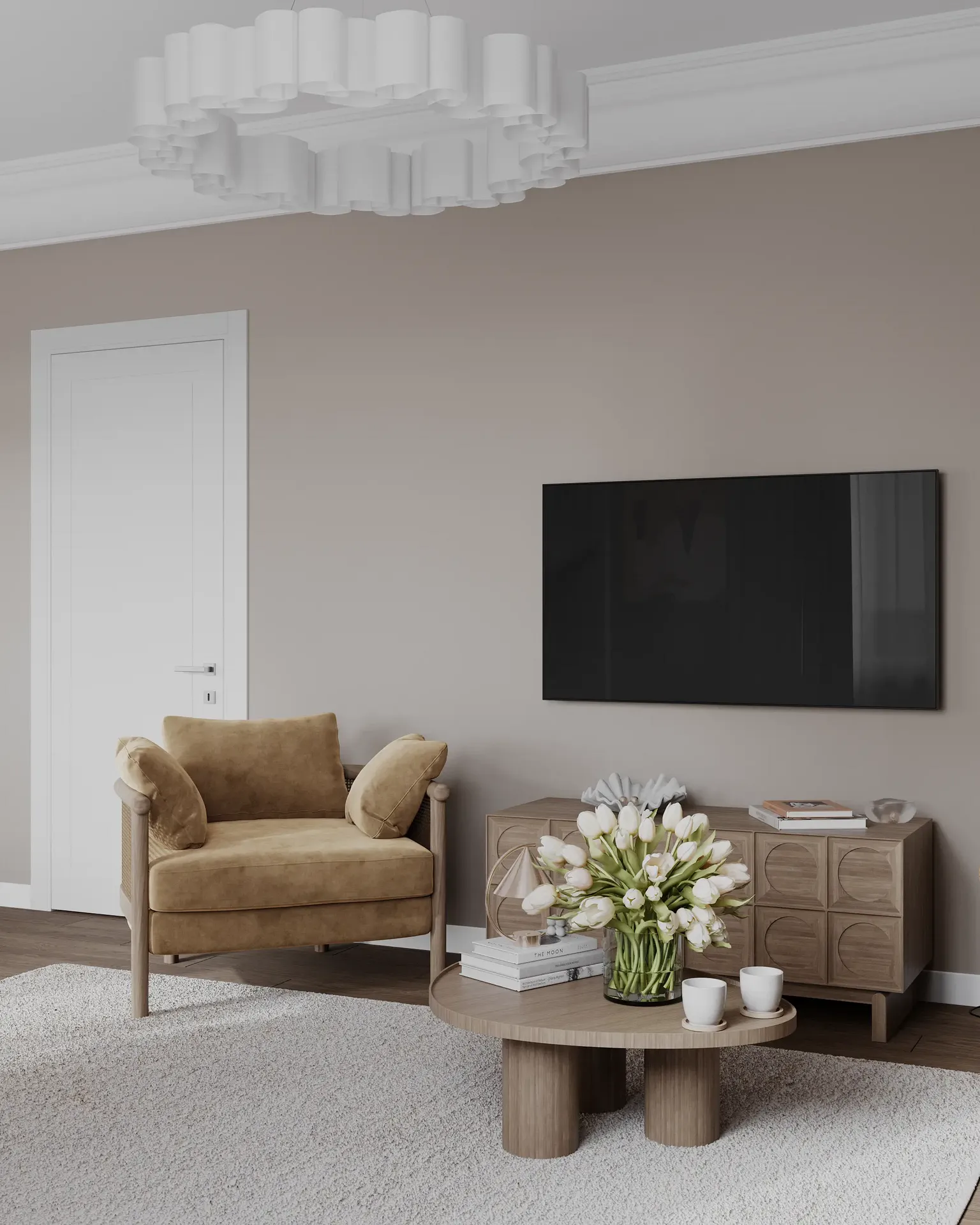 Angled view of a TV zone with a media unit, armchair, and entrance.