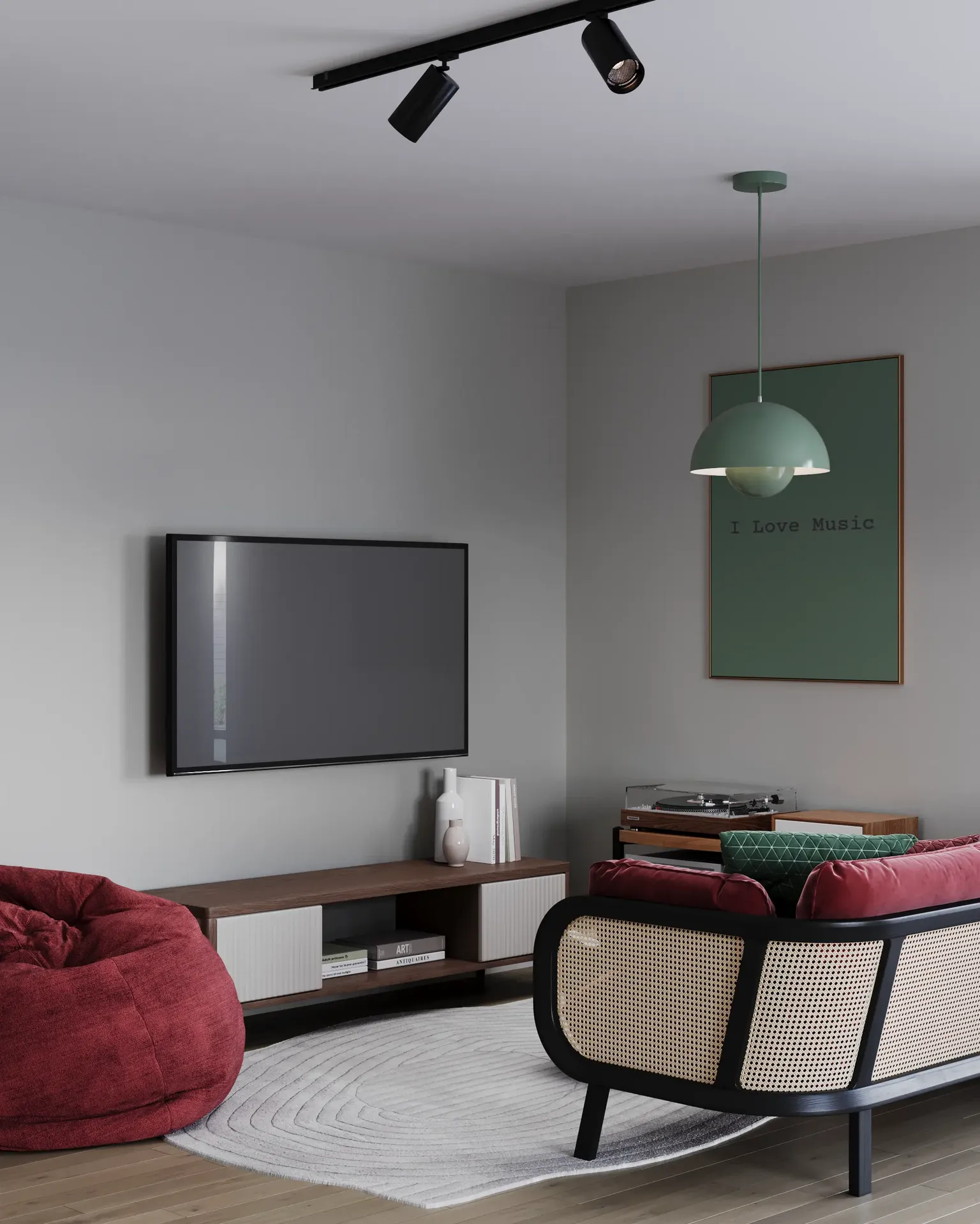 Angled view of a TV zone, pouf, and sofa.