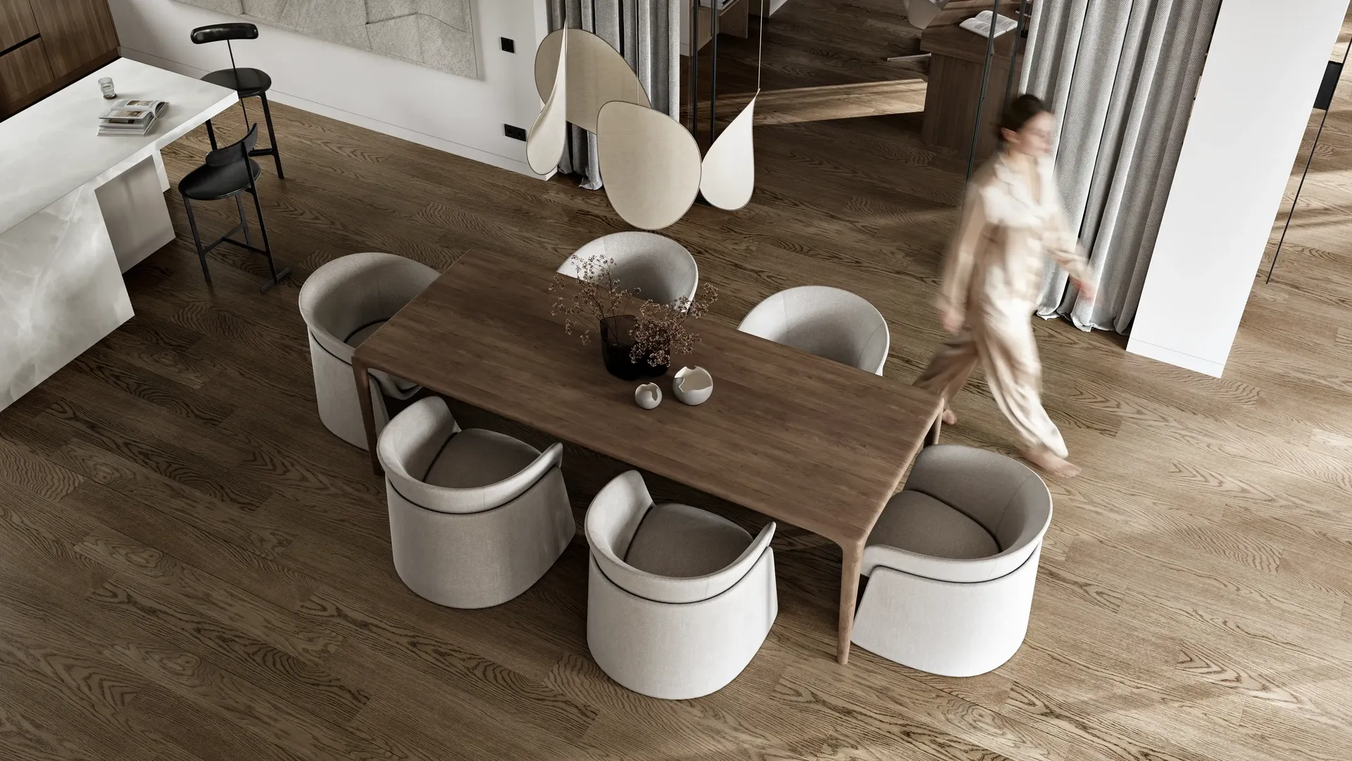 Elevated 3D render of a modern dining room with a wood table and moving figure.