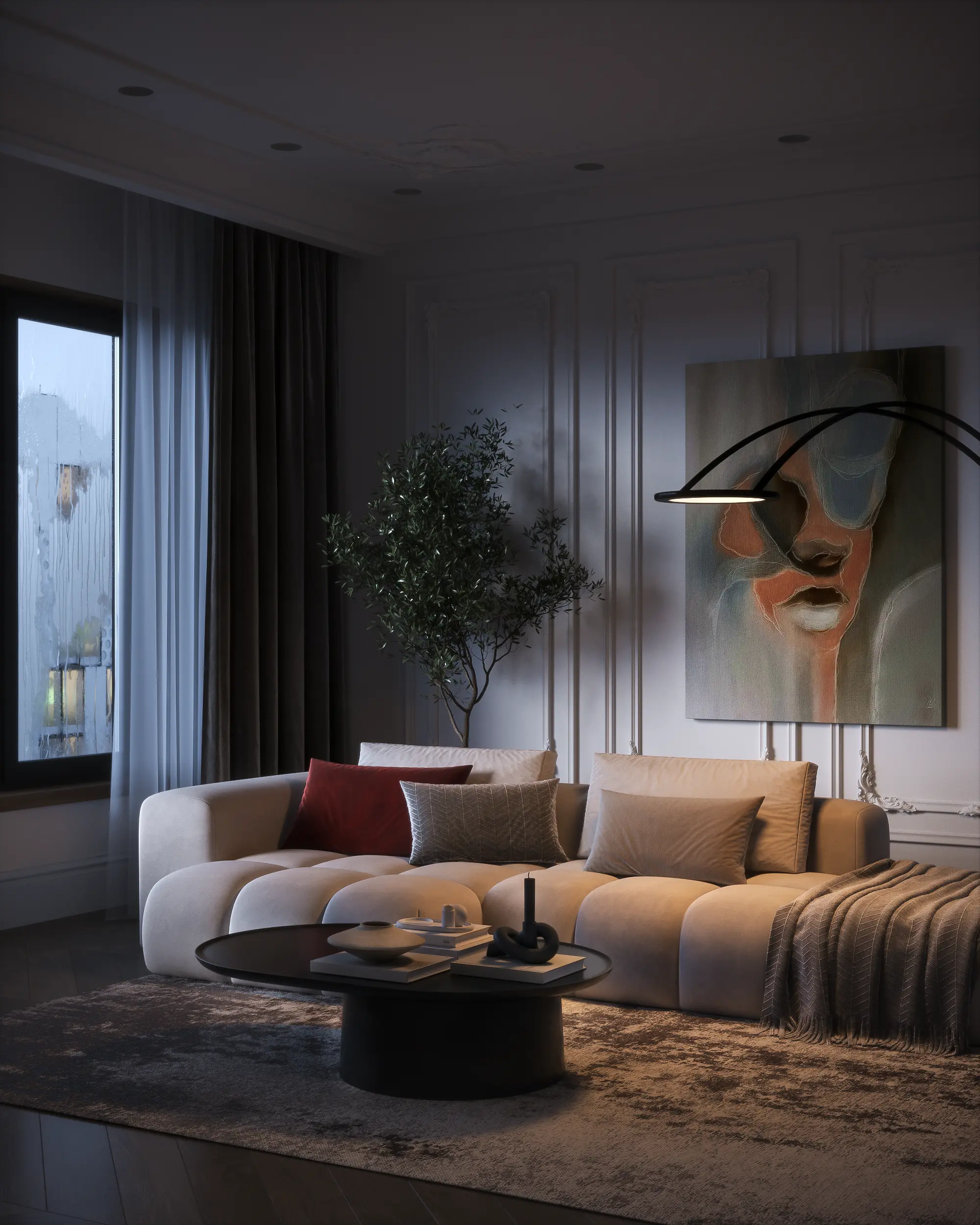Cozy living room with a beige tufted sofa, colorful pillows, a black coffee table with decorative items, a textured rug, a floor lamp, and a large abstract painting on the wall.