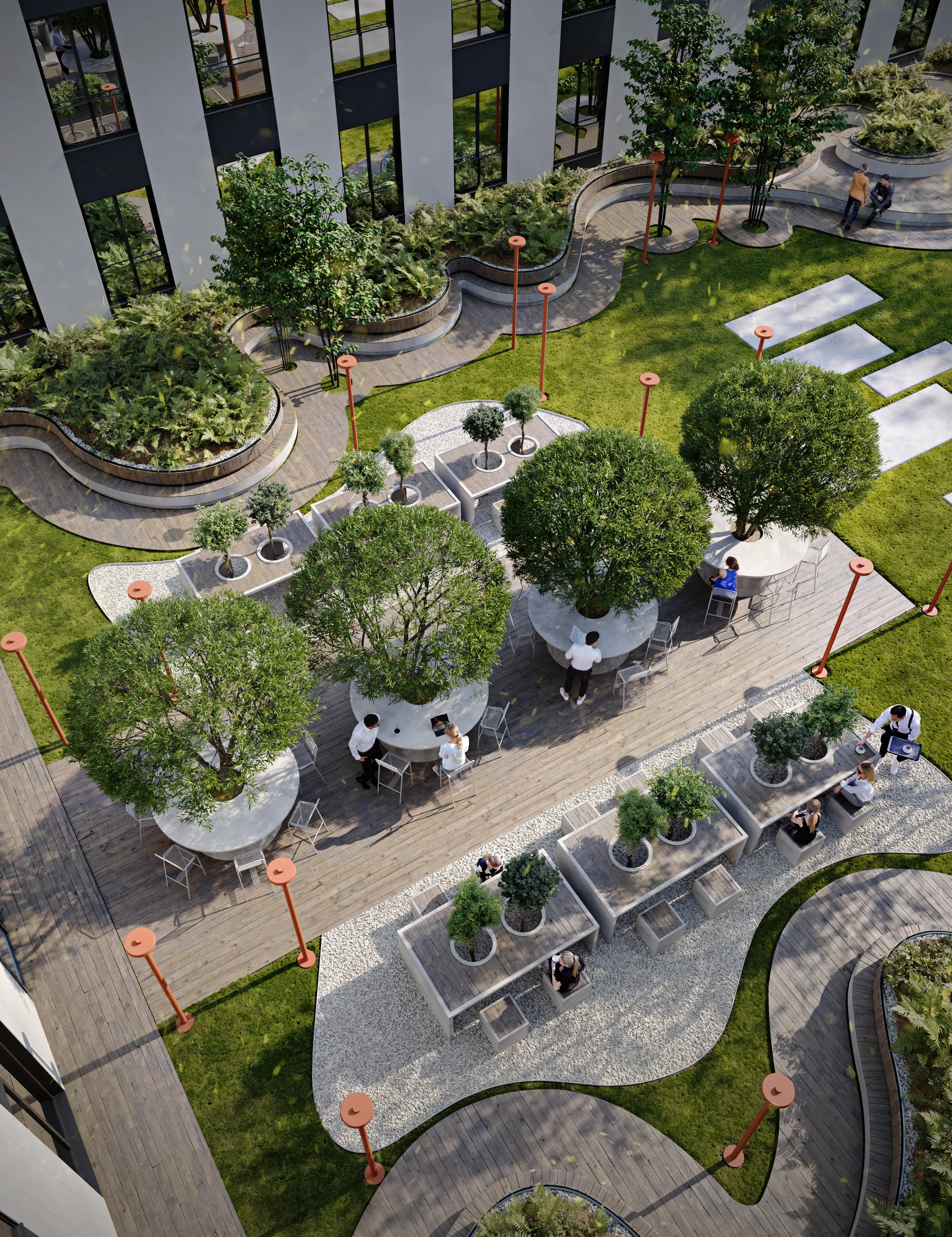 Aerial view of a landscaped outdoor patio with round tables shaded by trees, people sitting and interacting, wooden walkways, and modern planters with greenery.