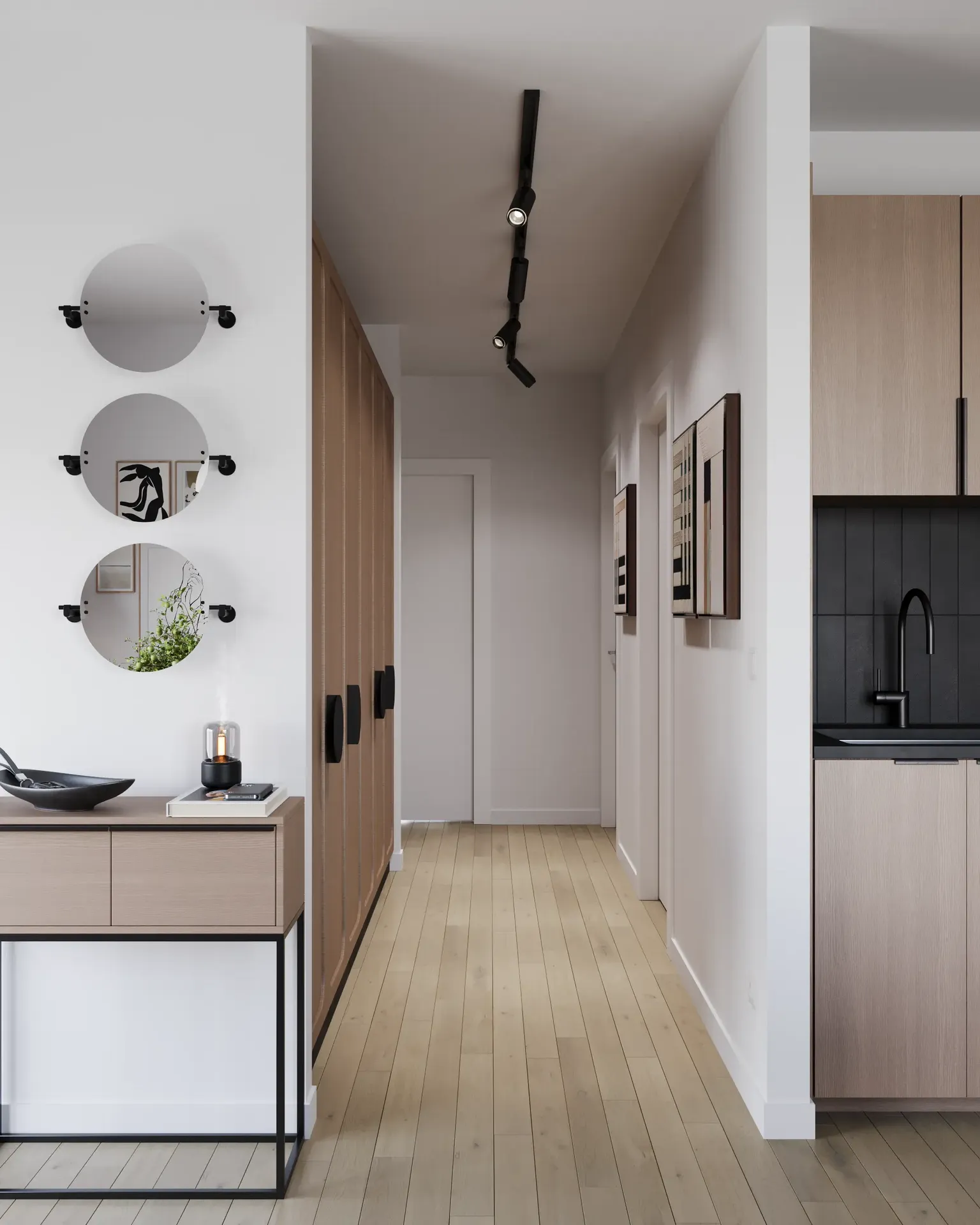 Vue générale du couloir avec console, miroirs et entrée cuisine.
