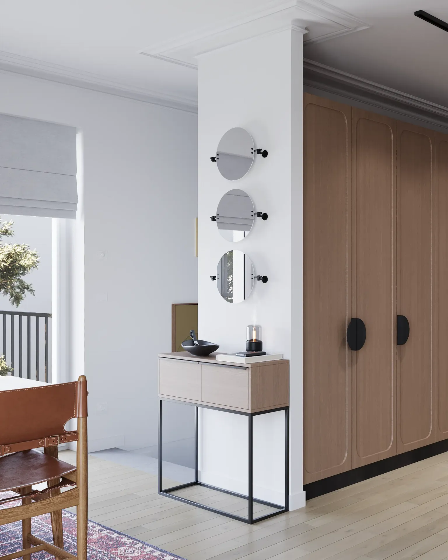 Vue en angle de l'entrée, de la console miroir et de l'armoire.
