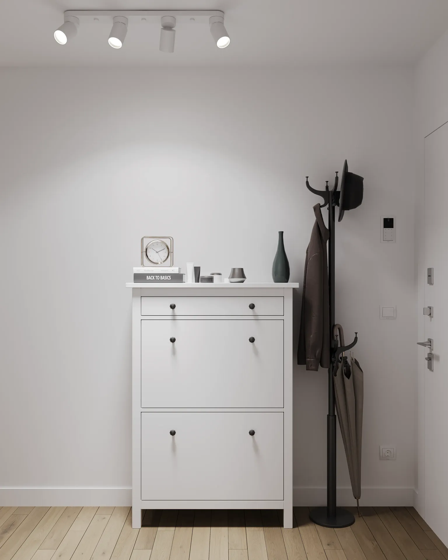 Vue de face d'une commode et d'un cintre.