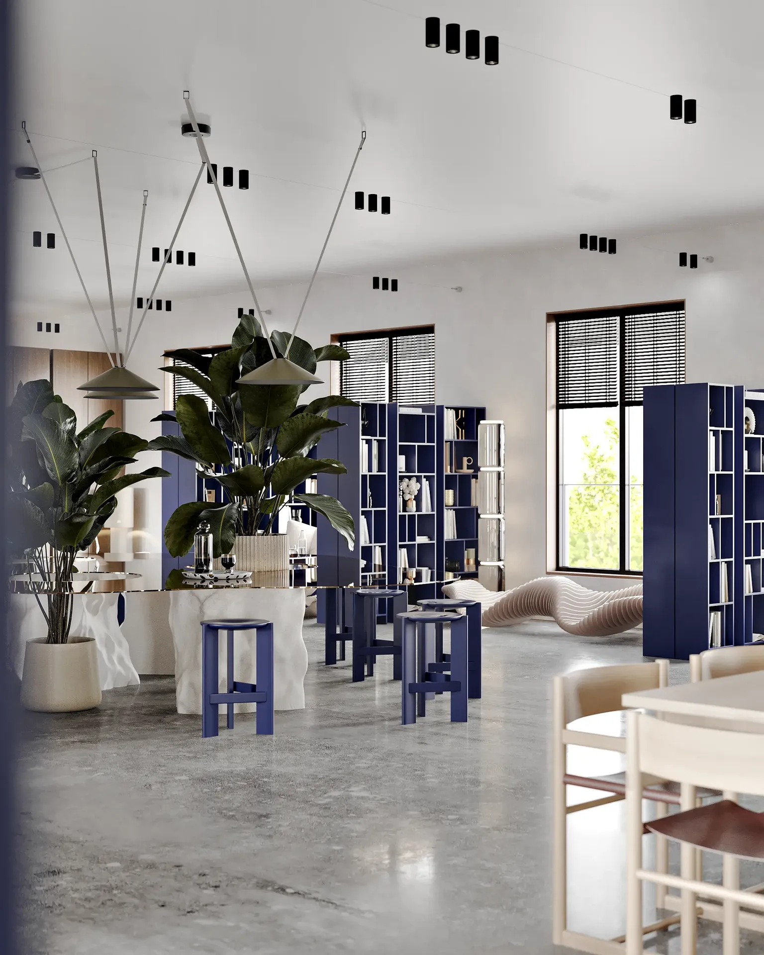 Amplia vista de una biblioteca moderna que muestra mesas de estudio individuales y amplias estanterías.