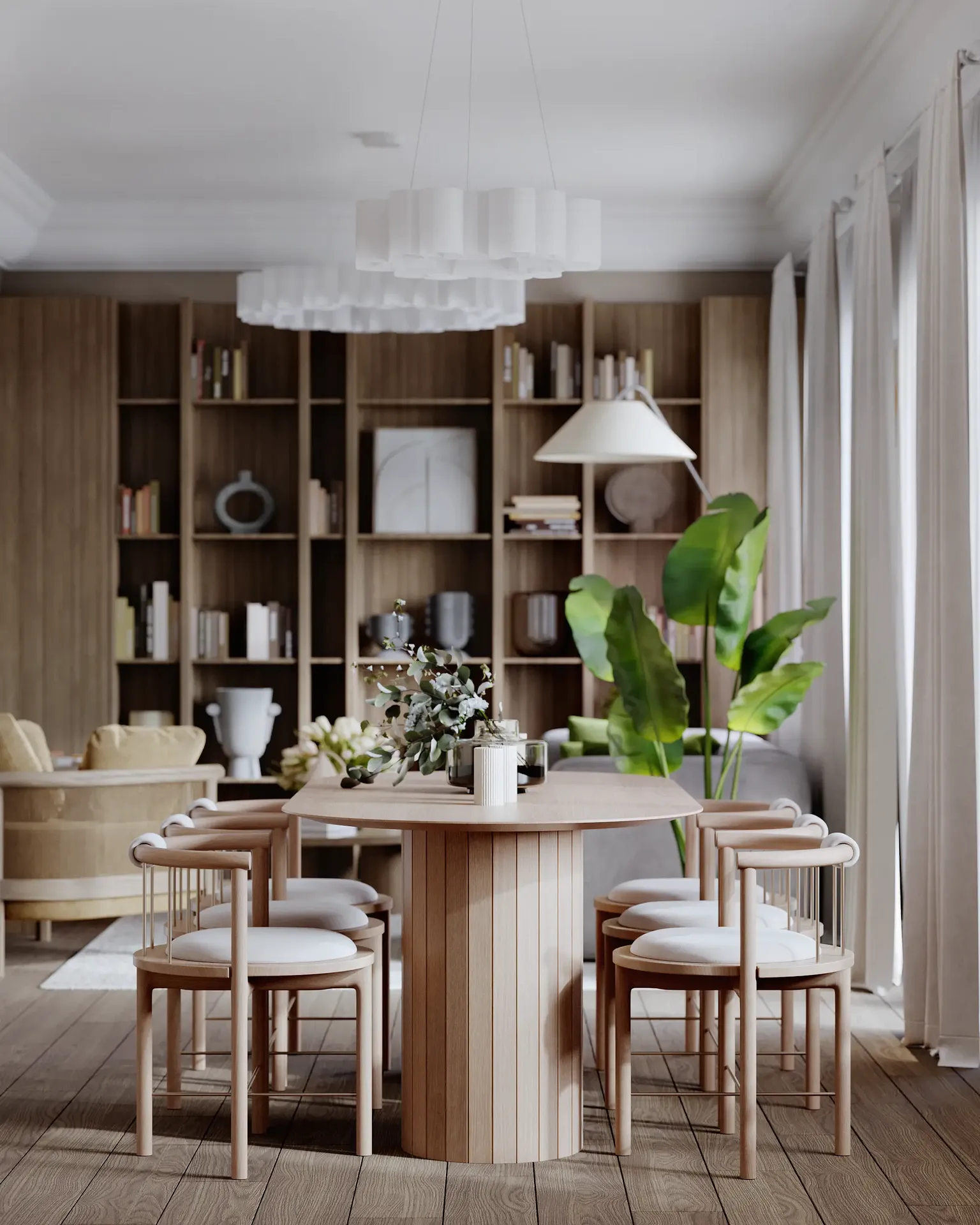 Vue du salon depuis la table à manger montrant les rangements et les étagères.