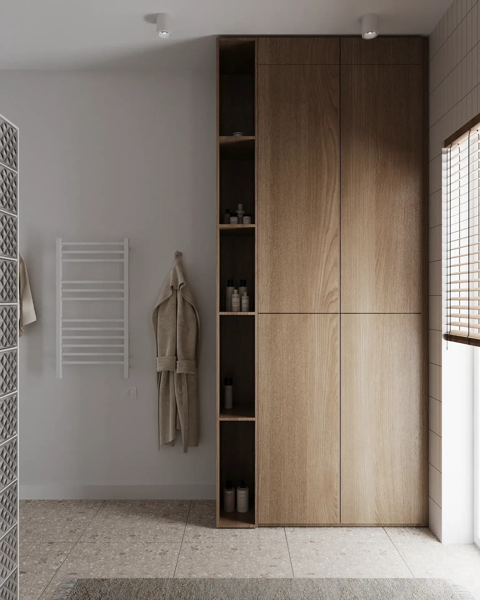 Vue de face d'un meuble de rangement et d'un sèche-serviettes dans une salle de bain.