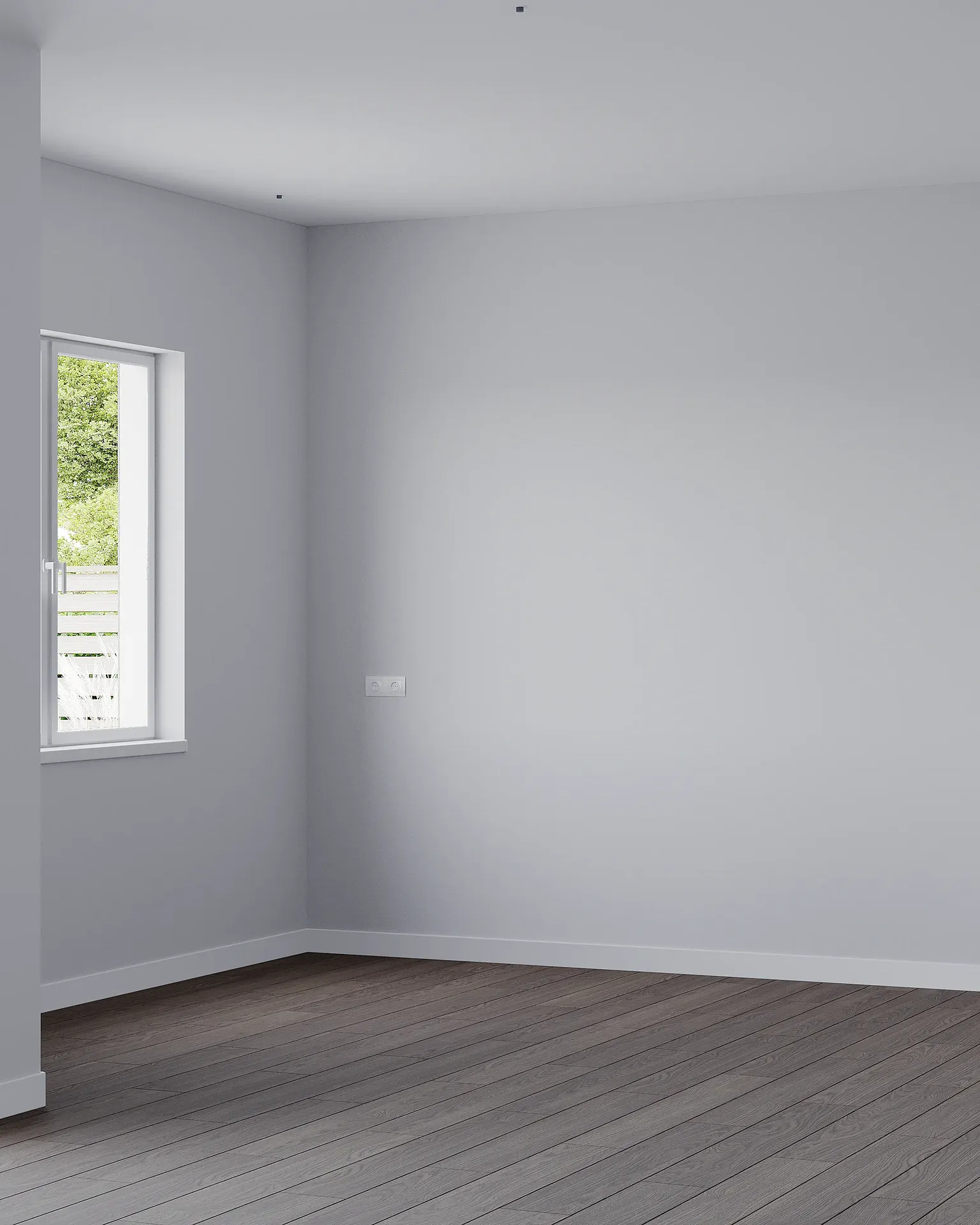 Vue détaillée des finitions de la cuisine avec murs peints, parquet et plinthes.