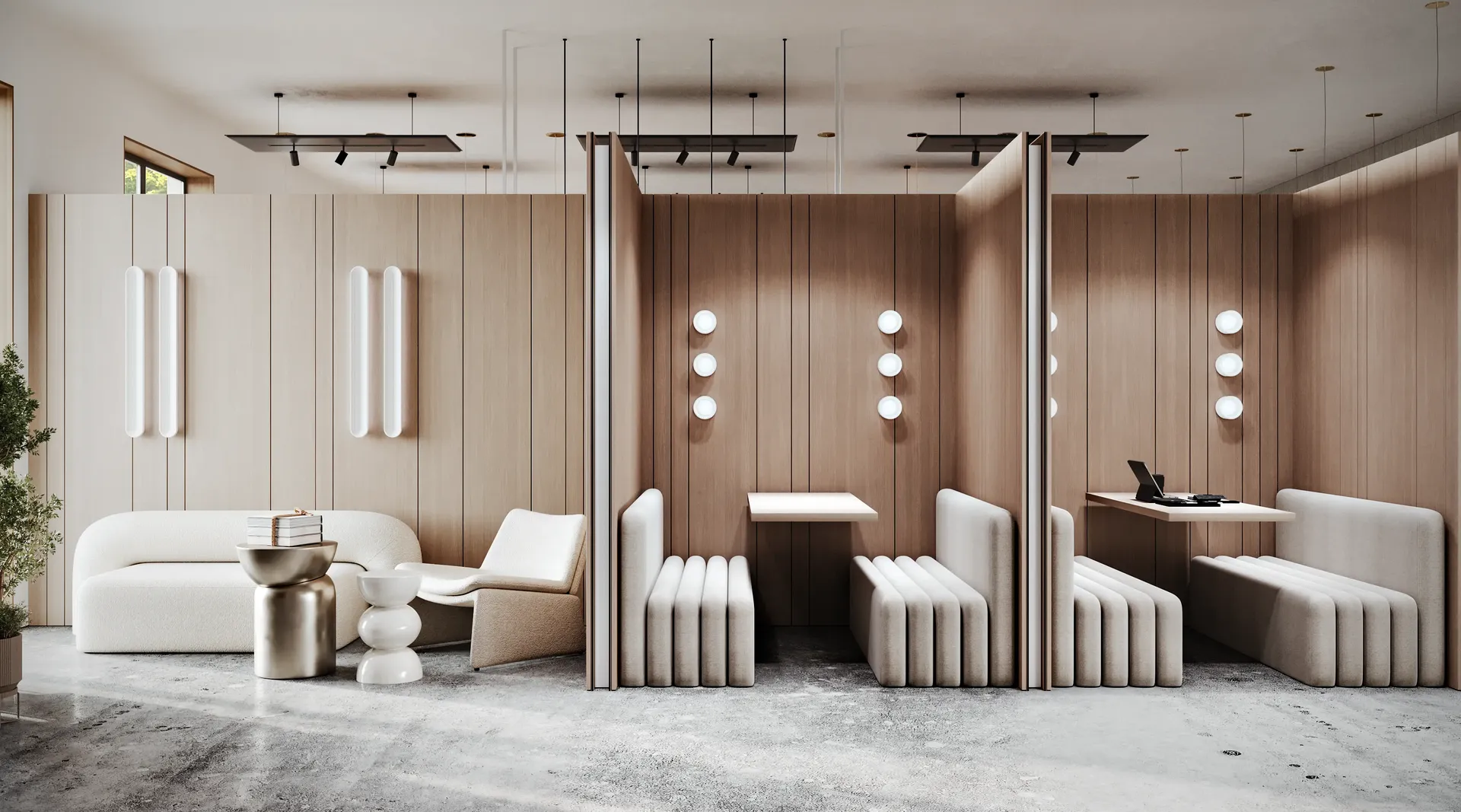 Módulos de reuniones semiprivados con mamparas de madera y una sala de estar principal con sofá y sillón.