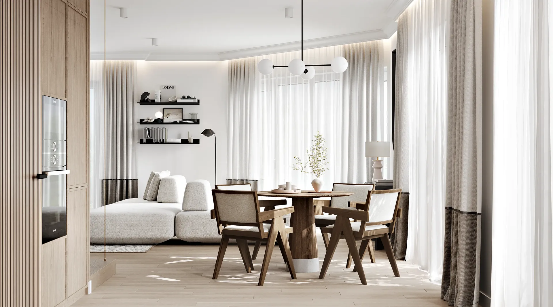 Blick von der modernen Küche auf den offenen Essbereich und das Wohnzimmer.