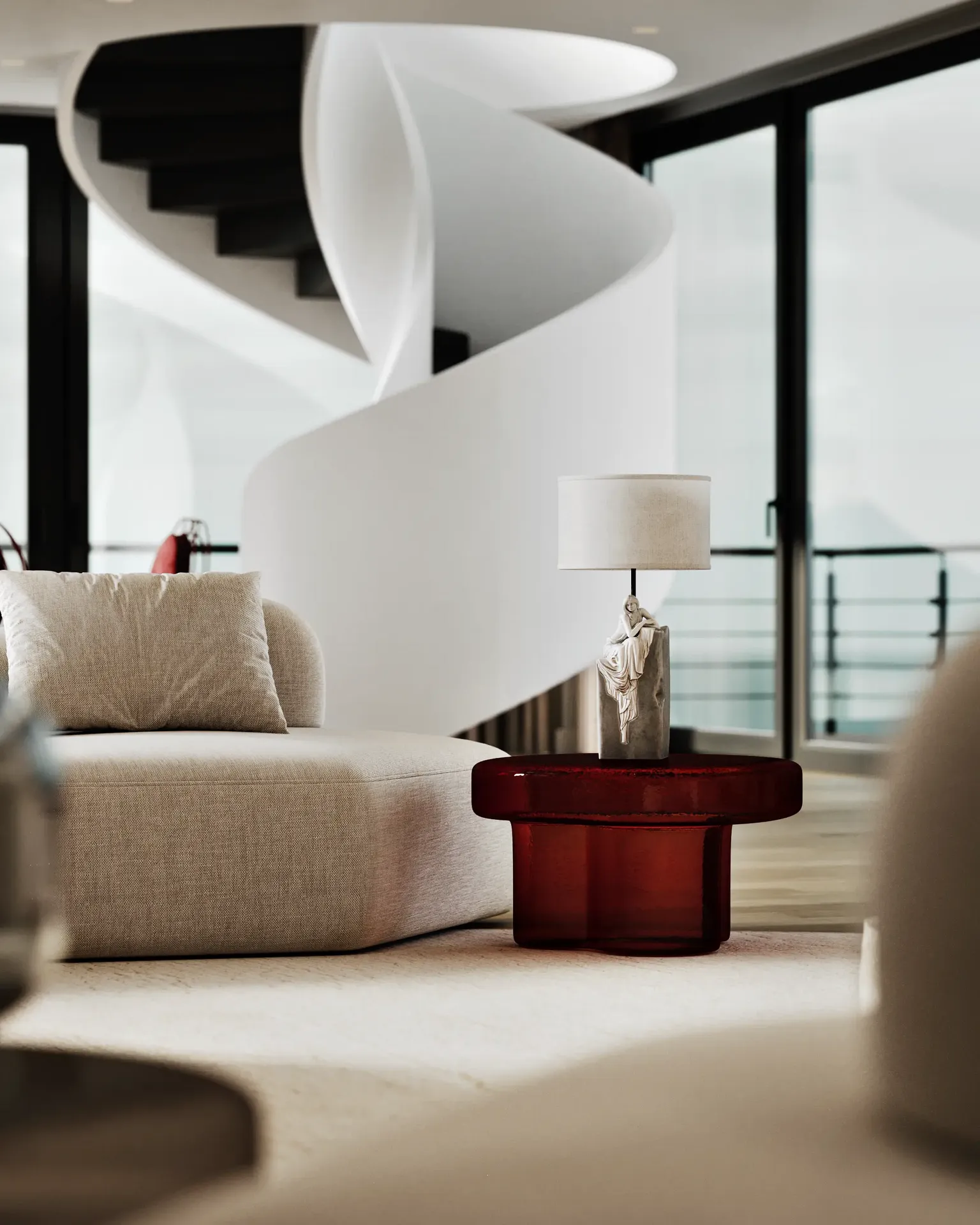 Detalle de una sala de estar moderna centrada en una elegante mesa de café de mármol con una cuidada decoración.