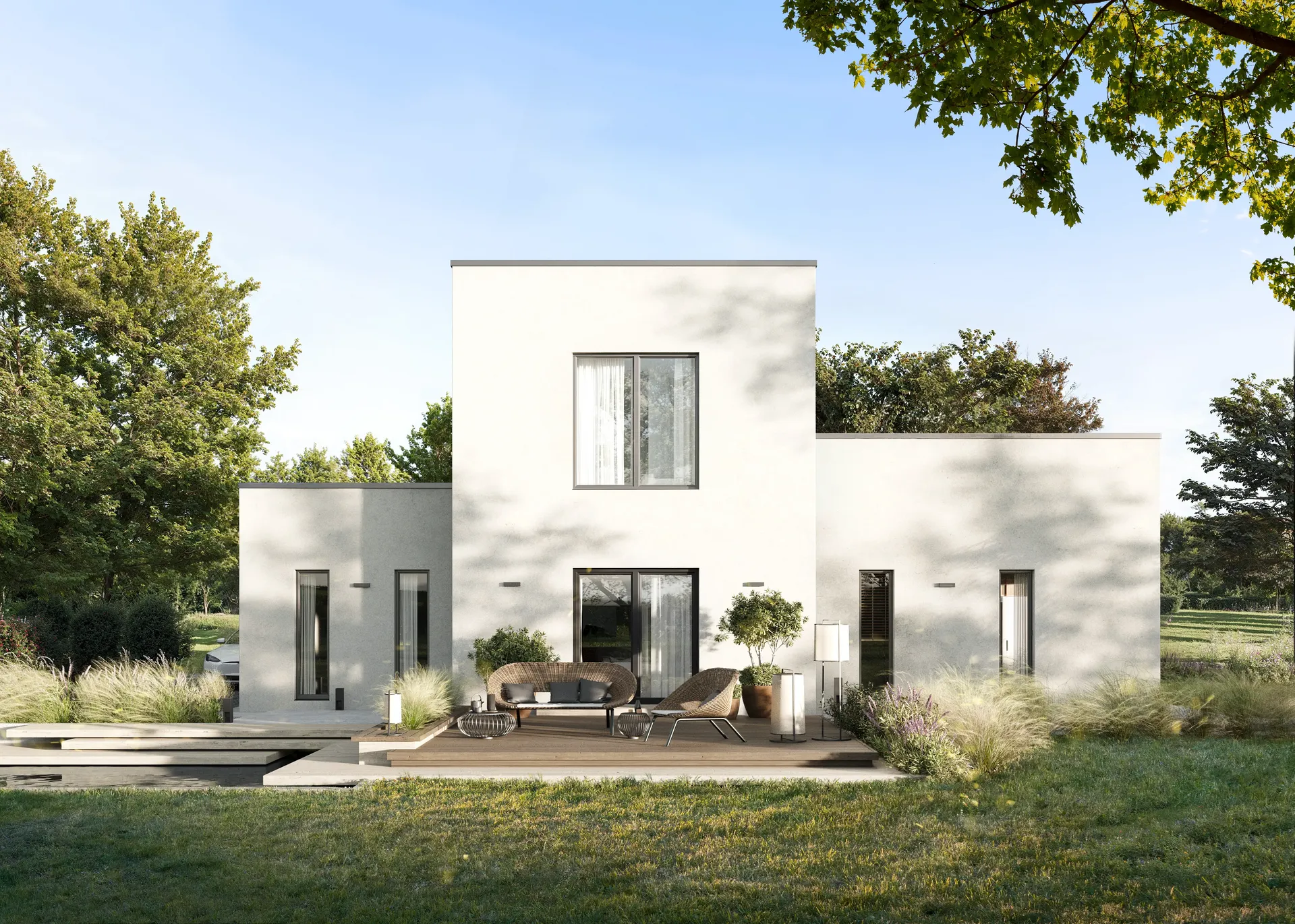 Vue avant de la façade arrière et de la terrasse.