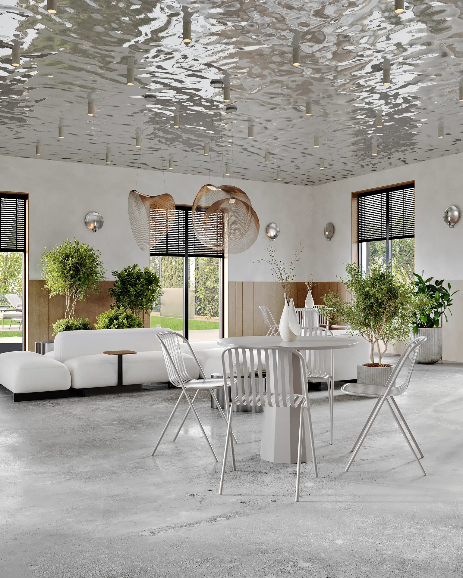 Comedor cafetería con una mesa junto a la ventana para cuatro personas y un sofá salón independiente.