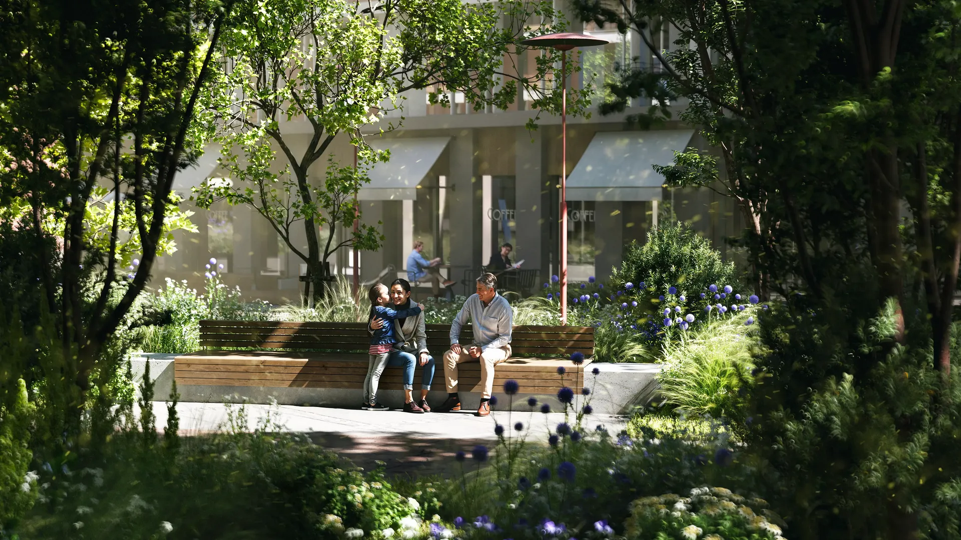 Espace de détente communautaire serein avec bancs modernes, vue à travers des parterres de fleurs luxuriants et paysagers.