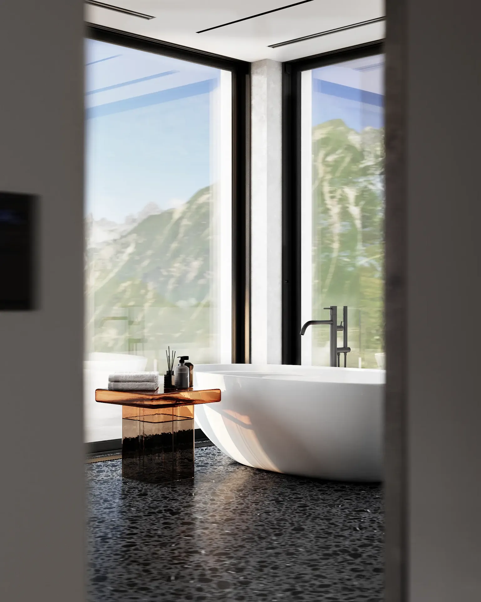 Vue depuis l'entrée d'une salle de bain moderne, mettant l'accent sur une baignoire autoportante et une table d'appoint.