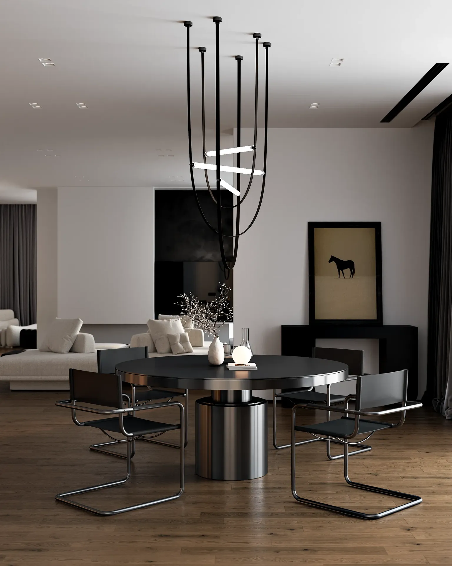 Vue frontale d'une salle à manger moderne, avec le salon confortable visible en arrière-plan.