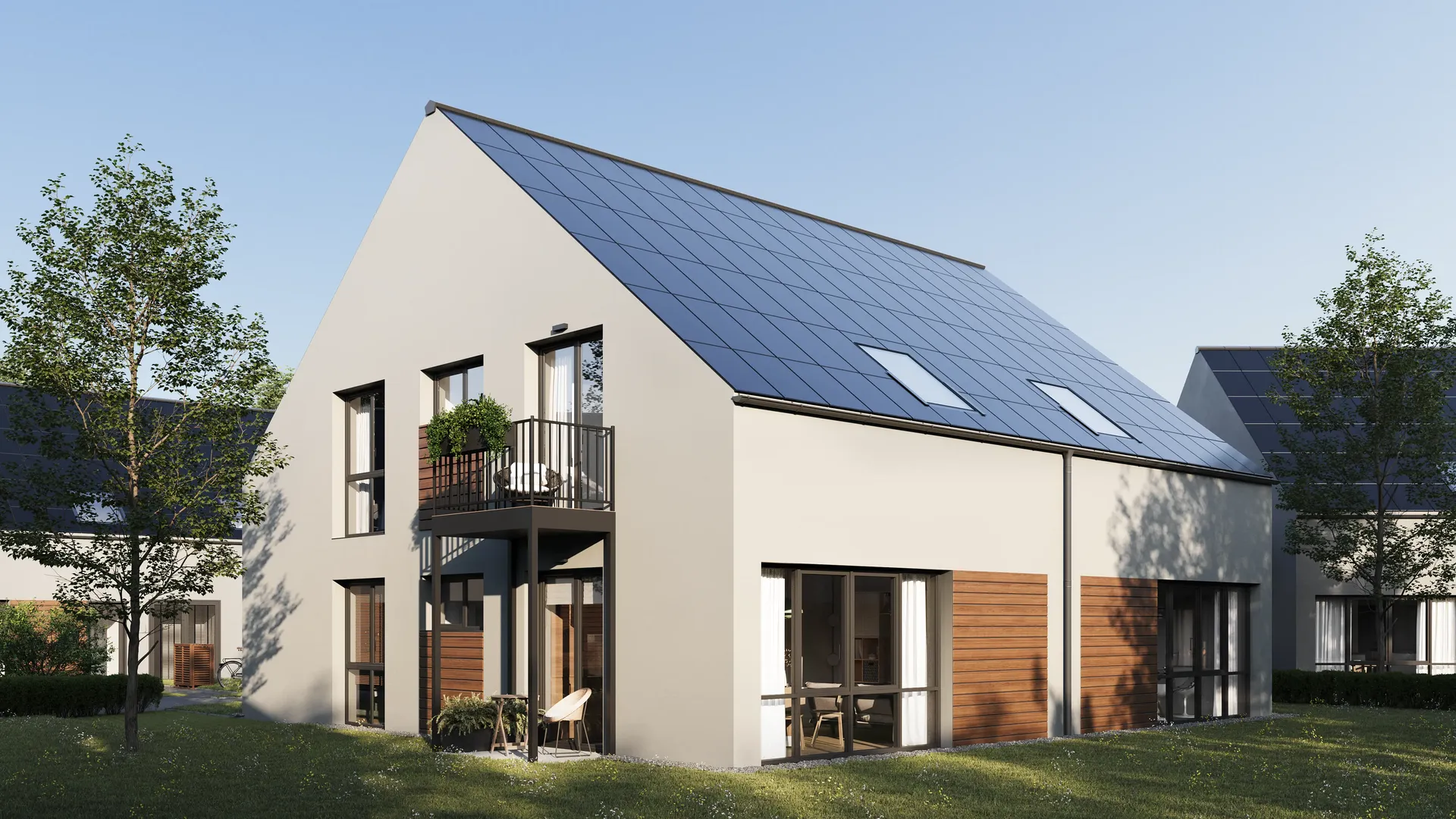 Vue inclinée d'une façade de maison à deux étages avec terrasse et balcon.