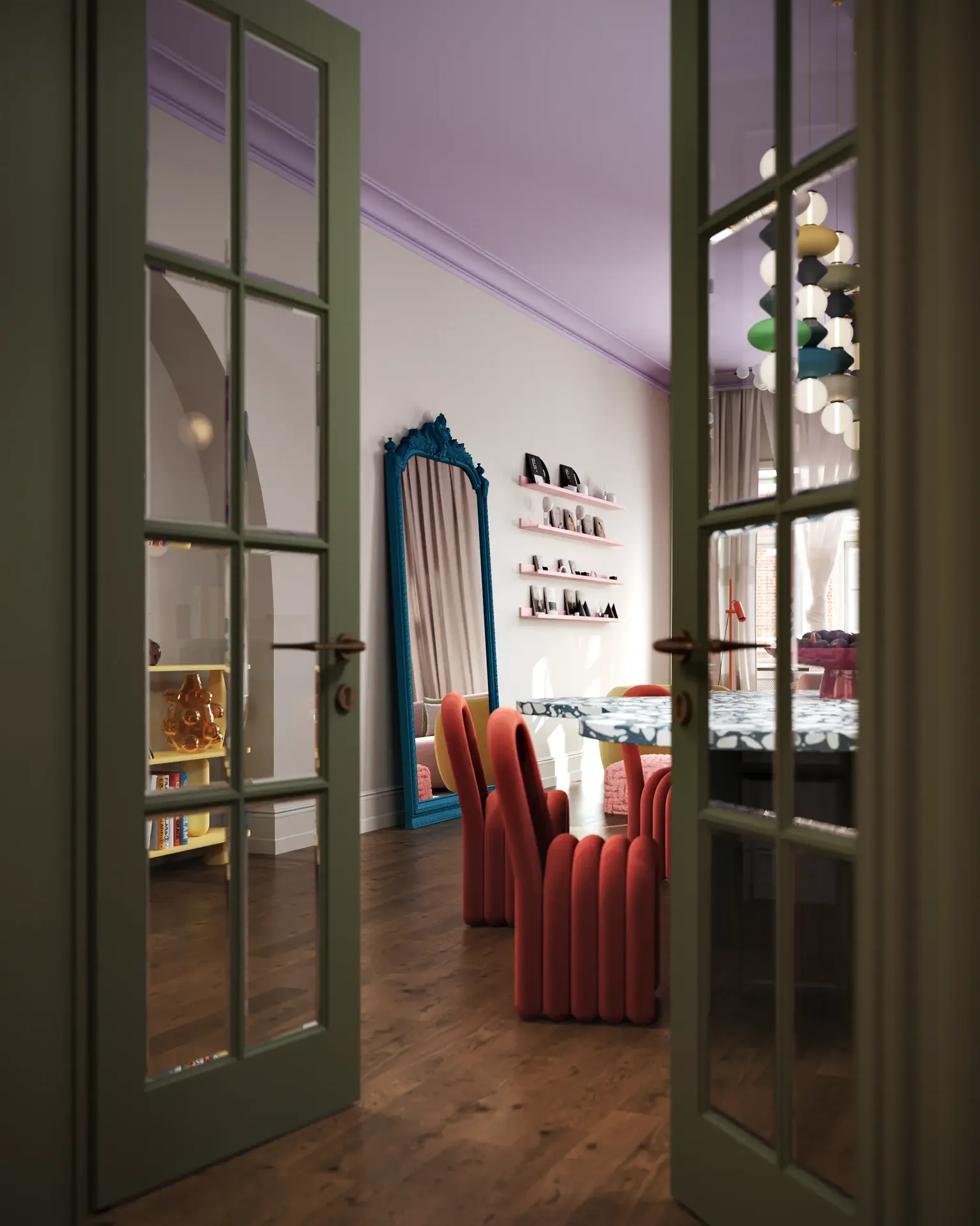 Blick vom Eingang in ein Wohnzimmer mit teilweisem Blick auf den farbenfrohen Essbereich.