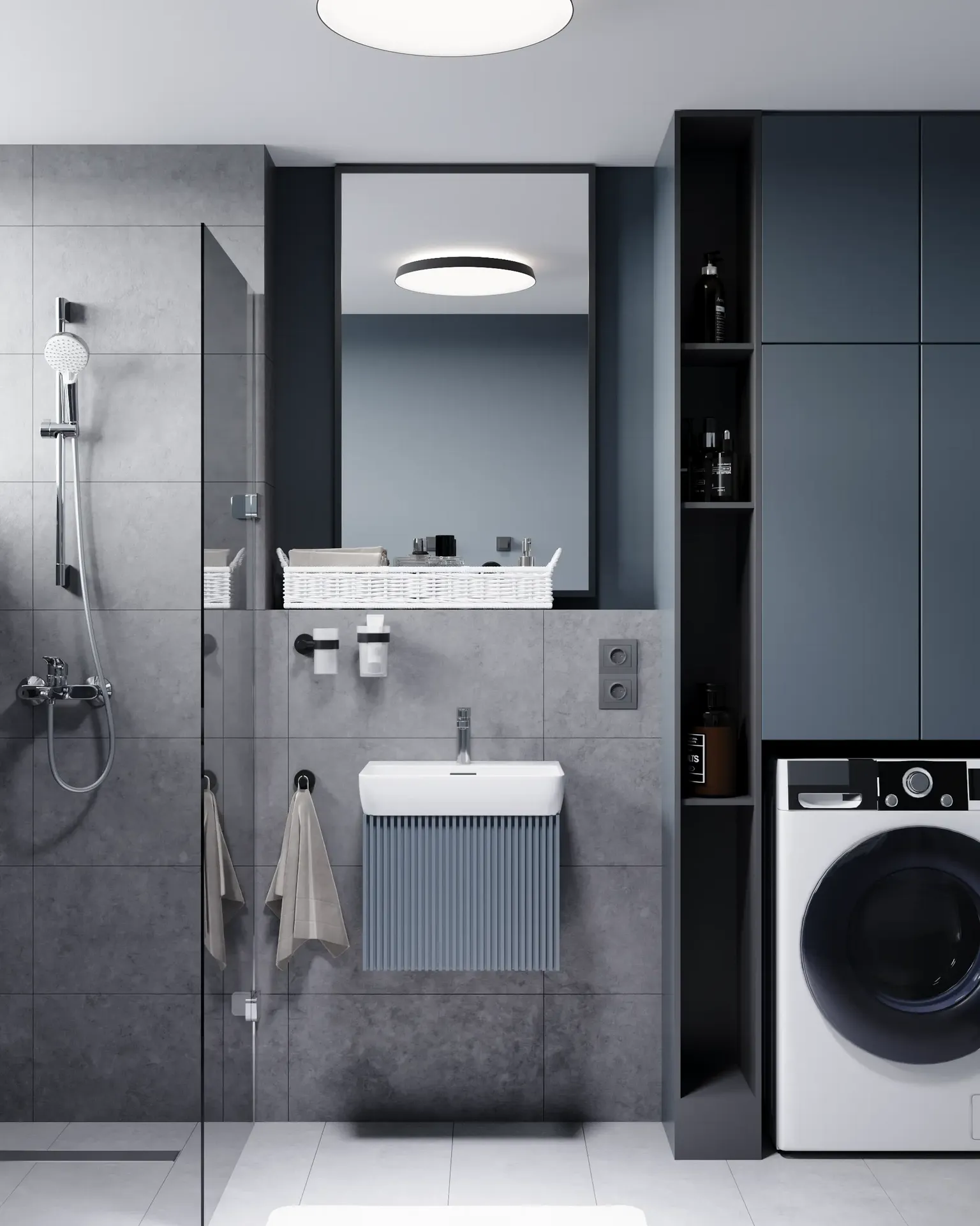 Vue de face d'un lavabo et d'une colonne avec lave-linge.