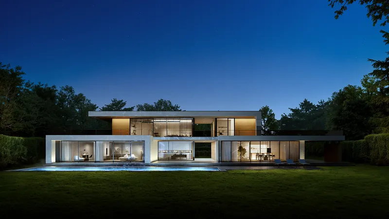 Nighttime villa exterior illuminated by architectural facade lighting