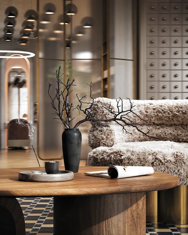 Close-up of a stylish side table and decorative vase in the modern salon waiting lounge.